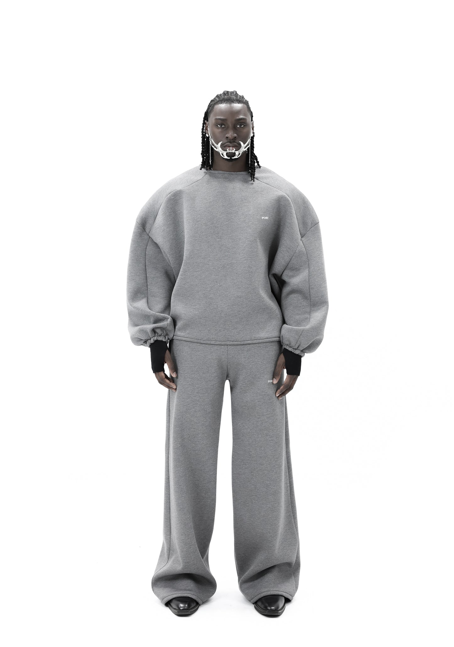 STATEMENT SEAM SWEATER
