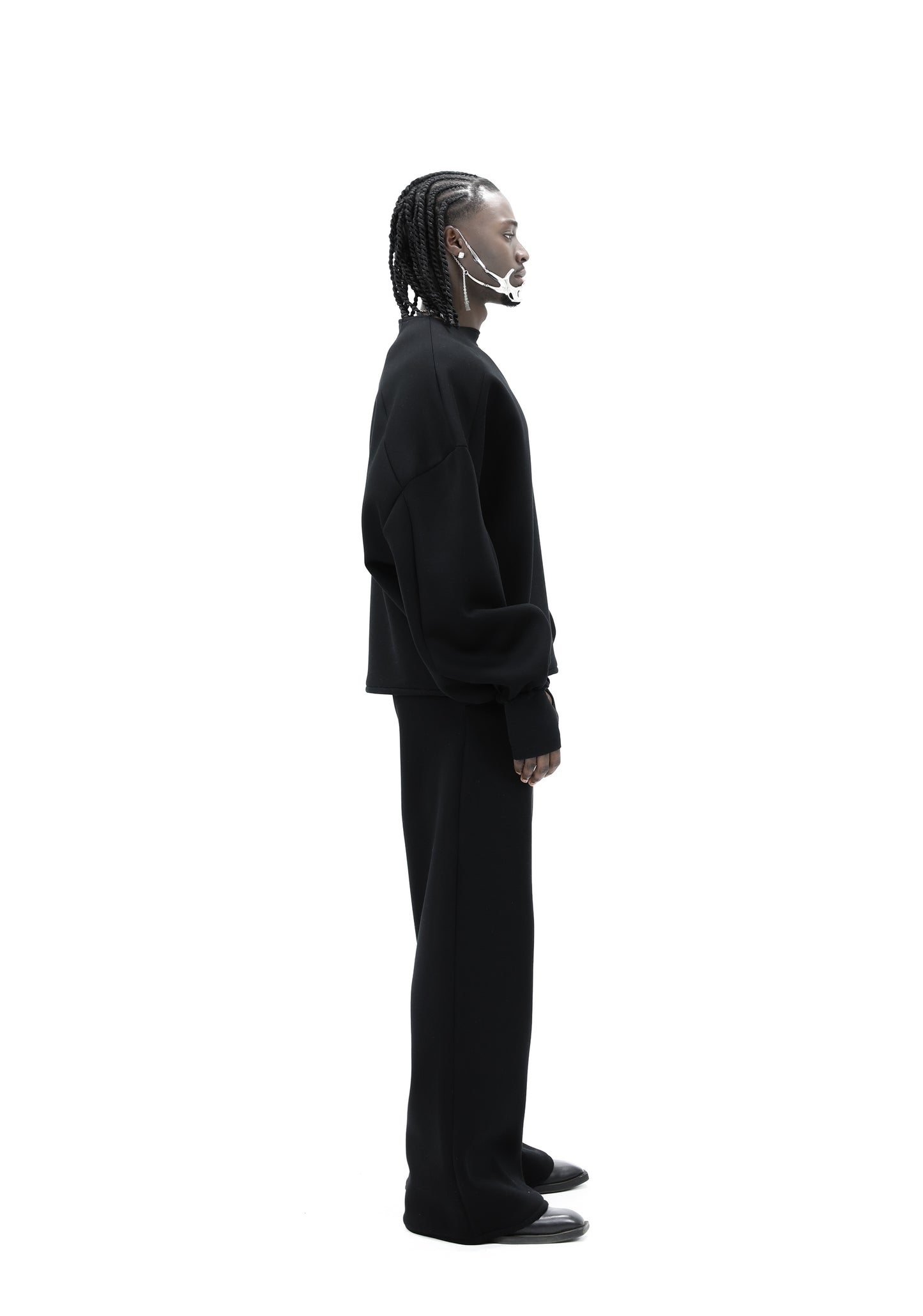 STATEMENT SEAM SWEATER