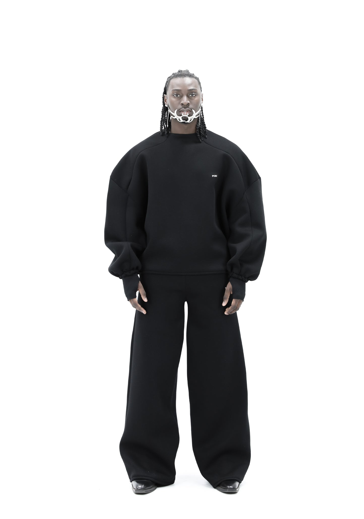 STATEMENT SEAM SWEATER